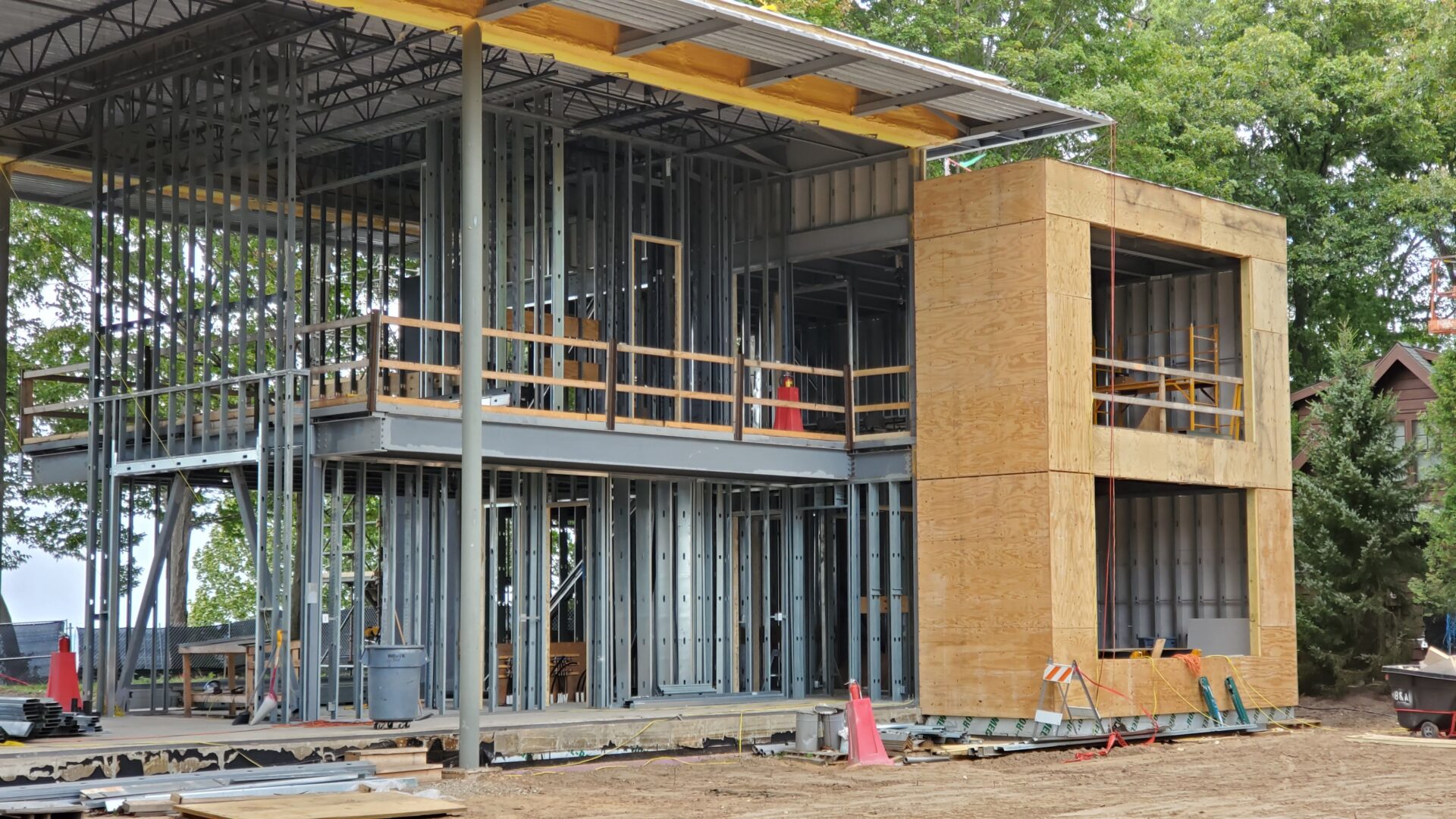 A building under construction with scaffolding around the outside.